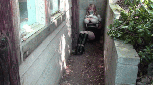 xsiteability.com -  Bound in a Tight Spot - Lorelei captive in Turtleneck Sweater, Skirt and Boots thumbnail