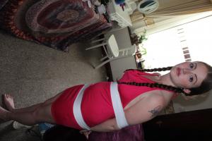 xsiteability.com - Rosie tape bound in red dress thumbnail