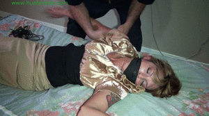 xsiteability.com - Hot blonde secreatary cruelly hogtied in thin leather cords thumbnail