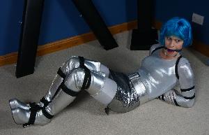 xsiteability.com - Silver Spacegirl tied up and gagged thumbnail