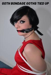 xsiteability.com - Foxy Roxy soft core glam goth tattooed rope bondage model tied up in boots thumbnail