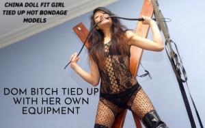 xsiteability.com - strung up China doll  tied up with flesh cutting rope st Andrews cross bondage thumbnail